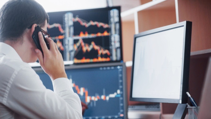stockbroker-in-shirt-is-working-in-a-monitoring-1-1-1