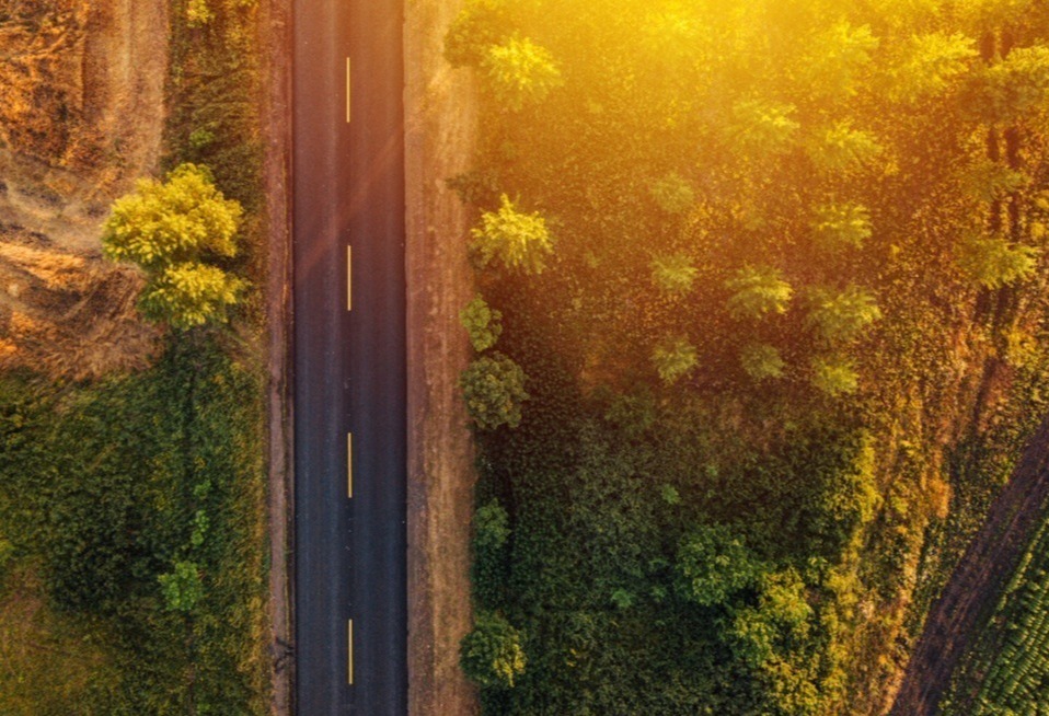 empty-road-through-countryside-in-sunset-aerial-v-2021-08-26-23-02-47-utc-1-2-1-1