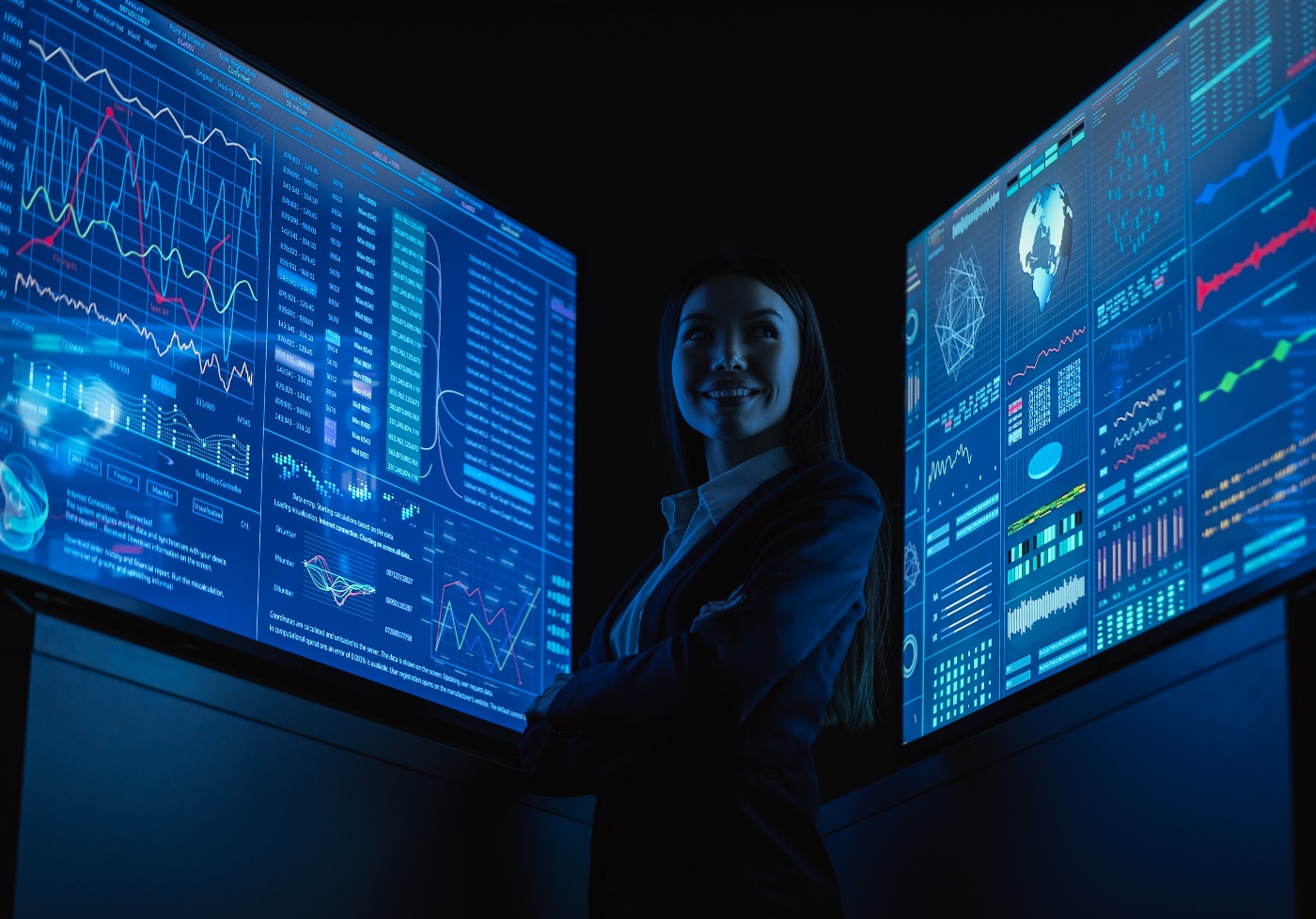 the-smiling-business-lady-standing-between-blue-mo-2023-11-27-05-22-03-utc-1